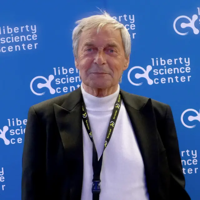 Erno Rubik holding a Rubik’s Cube